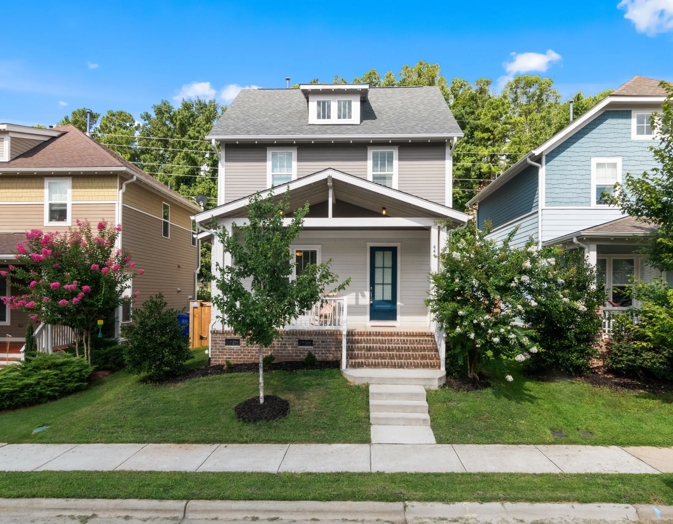 Suburban two-story home with painted siding and trim